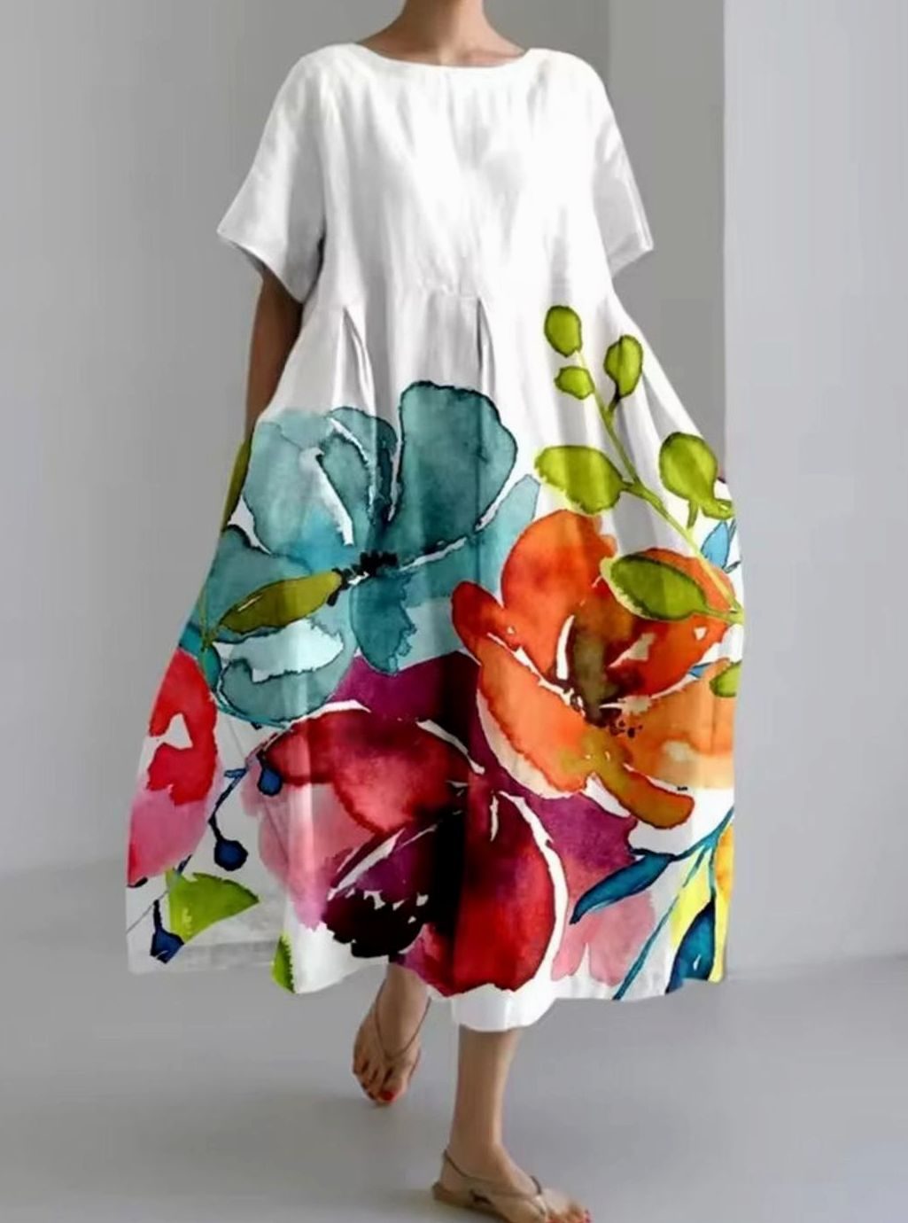 Vestido largo de verano para mujer, con delicados apliques florales. Cuello redondo, estilo cómodo y muy elegante.