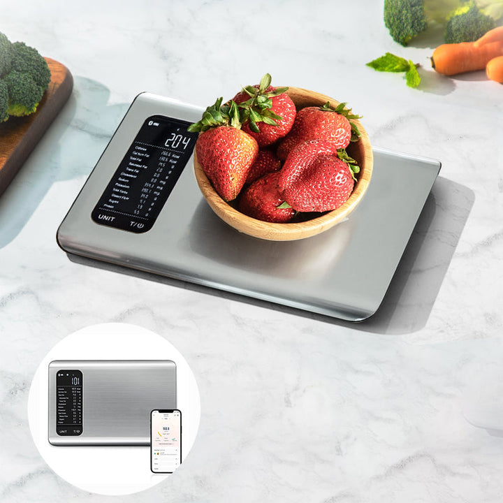 Balanza digital de cocina inteligente para seguimiento preciso de alimentos y nutrición diaria.