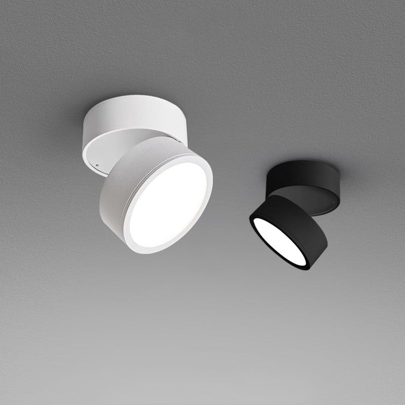 Foco LED de techo orientable, diseño moderno para iluminación interior.