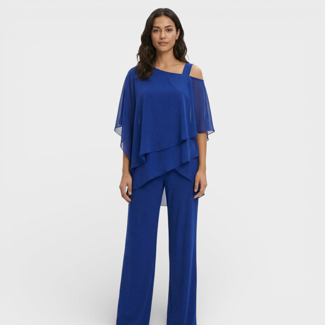 Traje de blusa y pantalón formal para mujer, look perfecto para celebraciones y graduaciones.