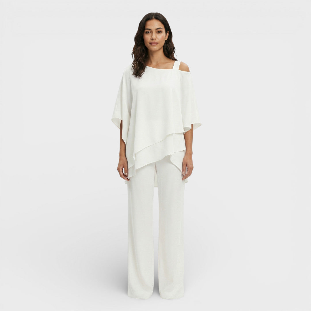 Blusa fluida y pantalón recto elegante para mujer, outfit de invitada para eventos especiales.