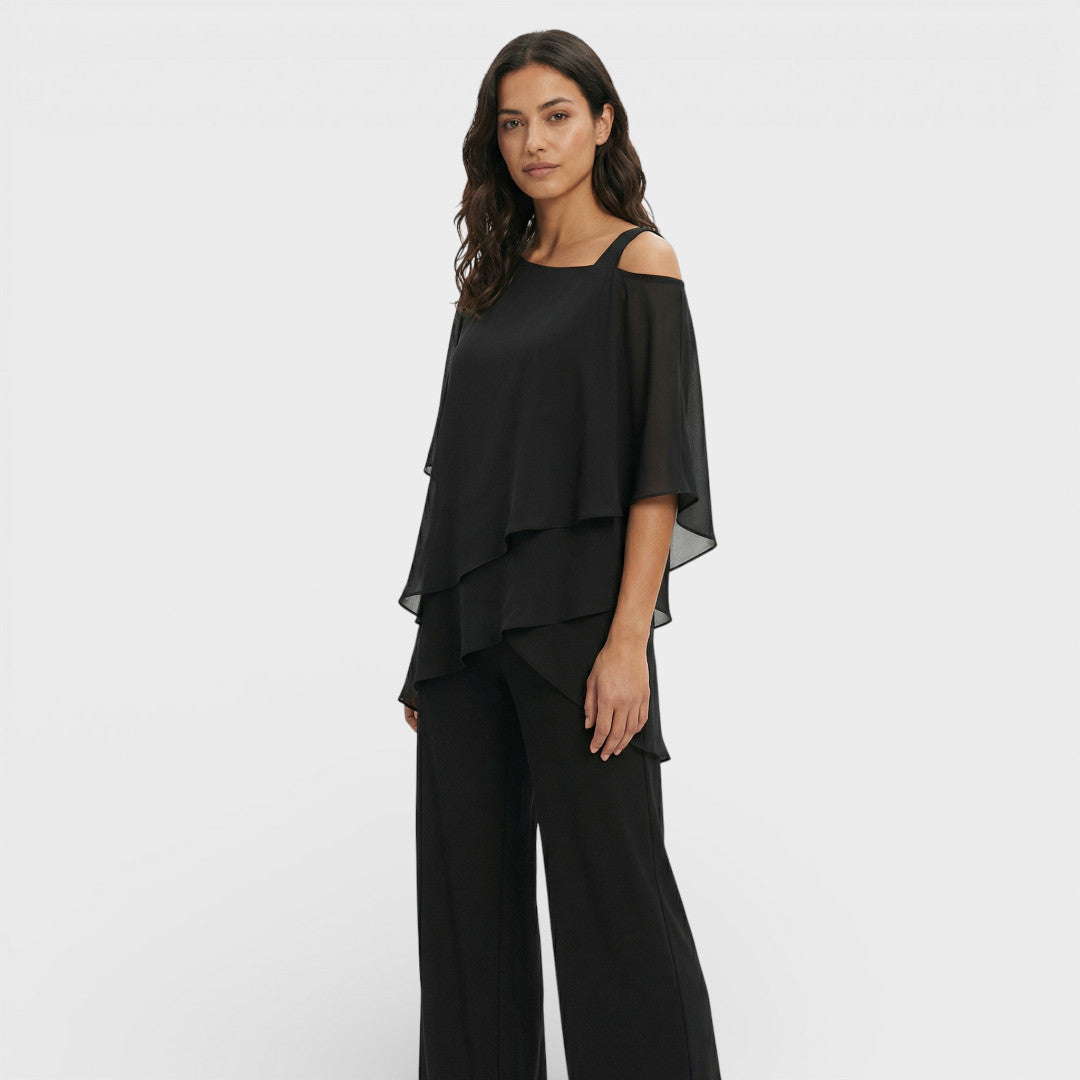 Conjunto elegante de blusa y pantalón para mujer, ideal para invitada de boda o fiesta.
