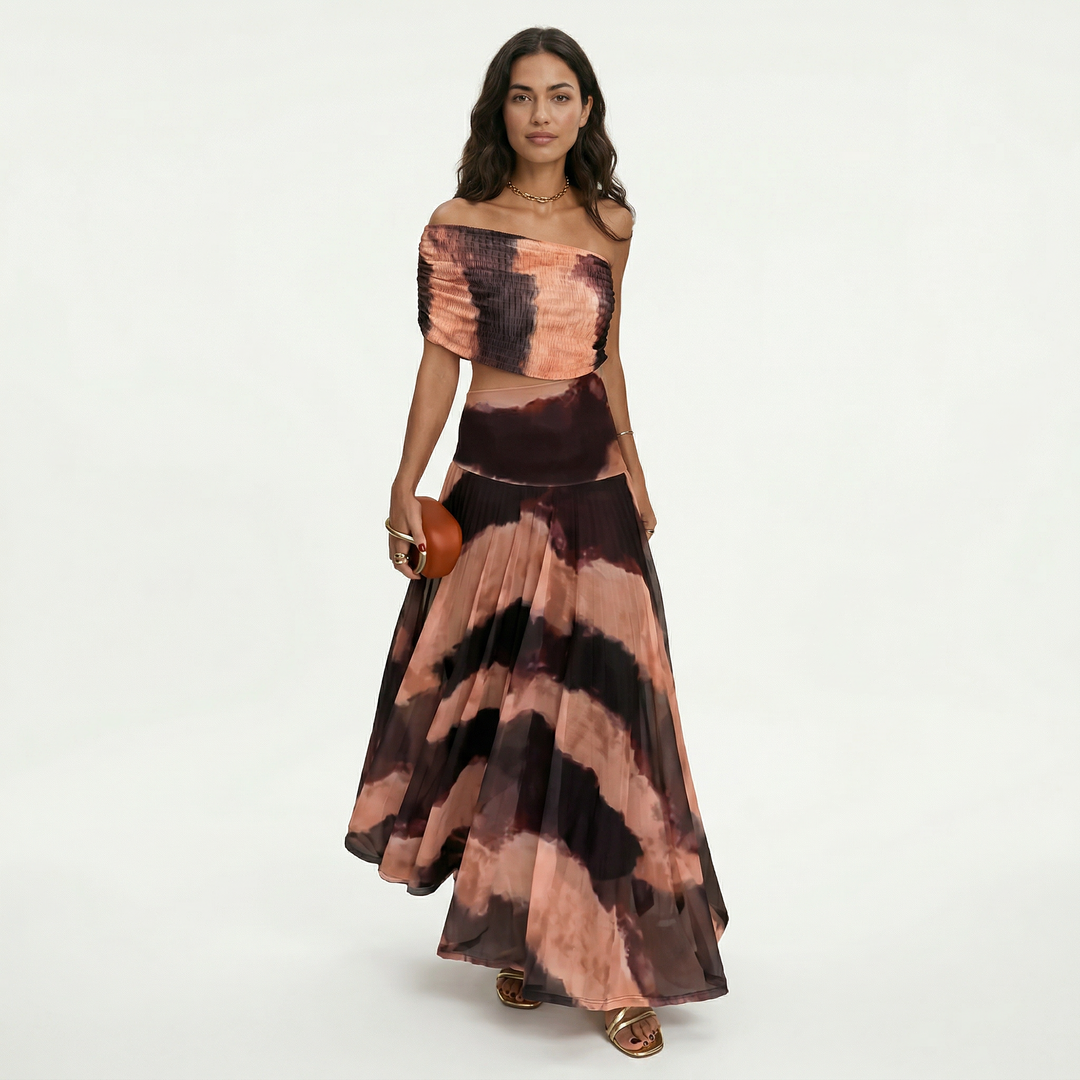 Elegante vestido largo asimétrico de mujer con caída fluida, perfecto para eventos, bodas y graduaciones.