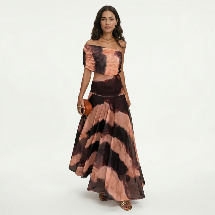 Elegante vestido largo asimétrico de mujer con caída fluida, perfecto para eventos, bodas y graduaciones.