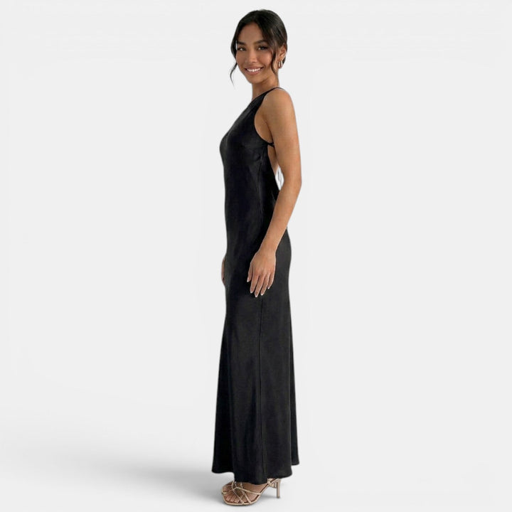 Vestido de fiesta para mujer, encaje, espalda abierta, silueta elegante y fluida, ideal para bailar.