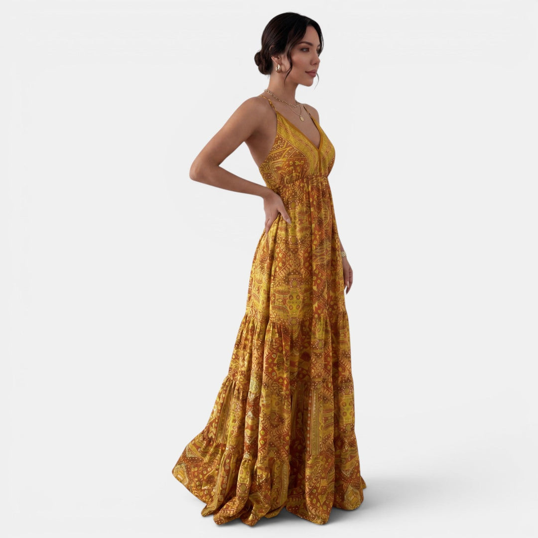 Vestido largo de playa estilo boho para mujer, con tirantes y un diseño veraniego. Confortable y moderno.