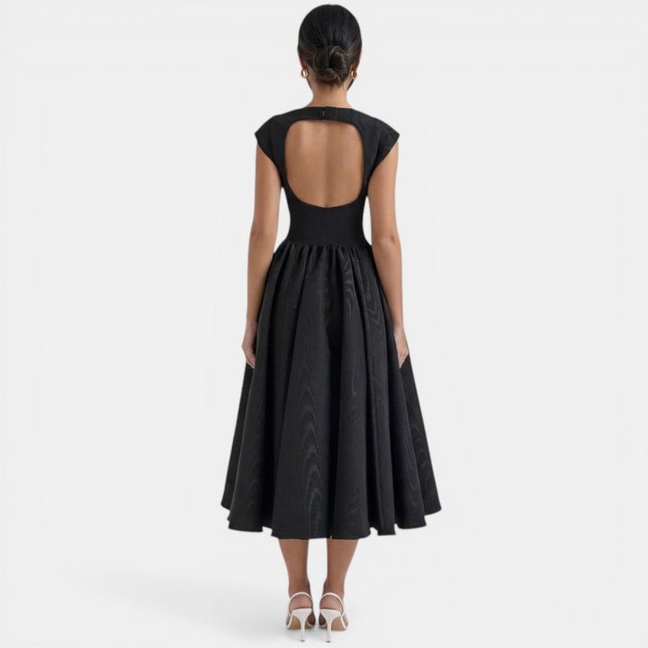 Vestido midi elegante de mujer sin espalda, ideal para fiesta, eventos de verano y ocasiones formales.