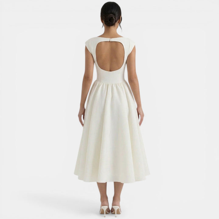Vestido midi casual de mujer, cuello redondo, perfecto para moda de verano y eventos diurnos.
