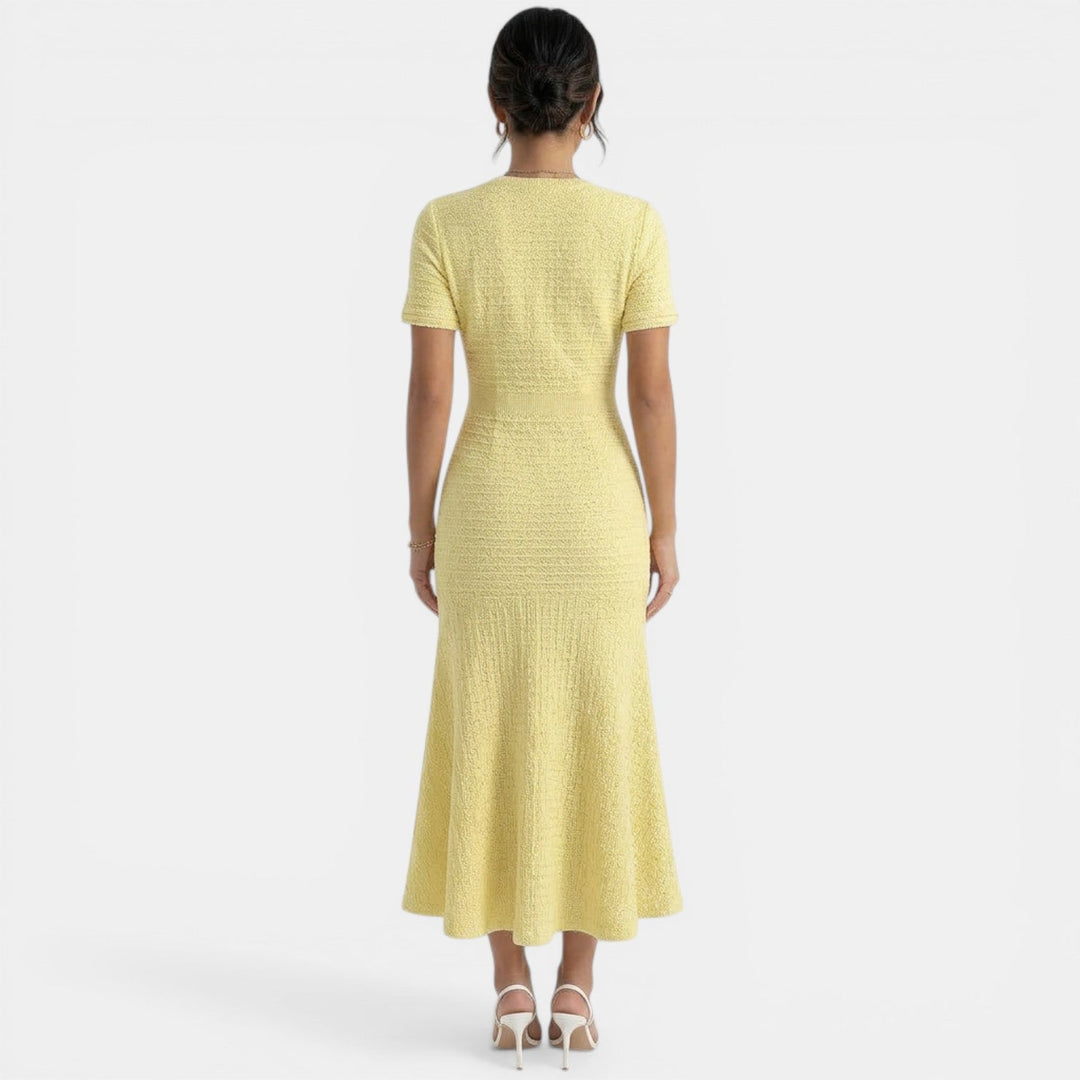 Vestido midi de oficina para mujer, corte ajustado. Elegante y profesional para el trabajo o reuniones.