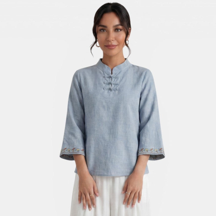Blusa bohemia de algodón lino para mujer, cómoda y fresca, con detalles bordados y mangas campana.