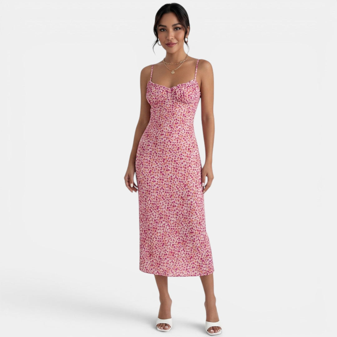 Vestido midi floral bohemio rosa para mujer, ideal para primavera/verano, estilo romántico y elegante.