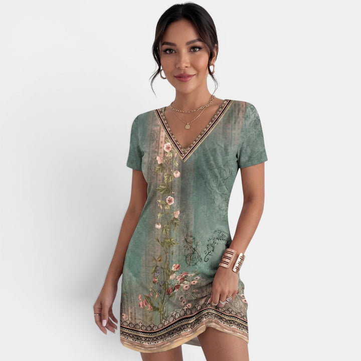 Vestido midi estampado de mujer con cuello V, ideal para verano, estilo casual y cómodo, moda femenina.