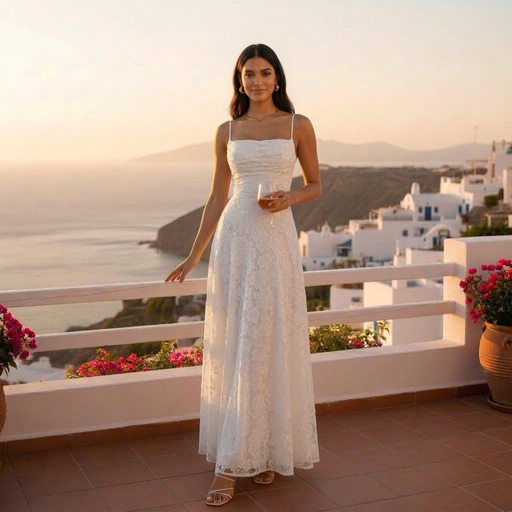 Vestido sofisticado sin espalda, ajustado, con lazos, ideal para fiesta de noche.
