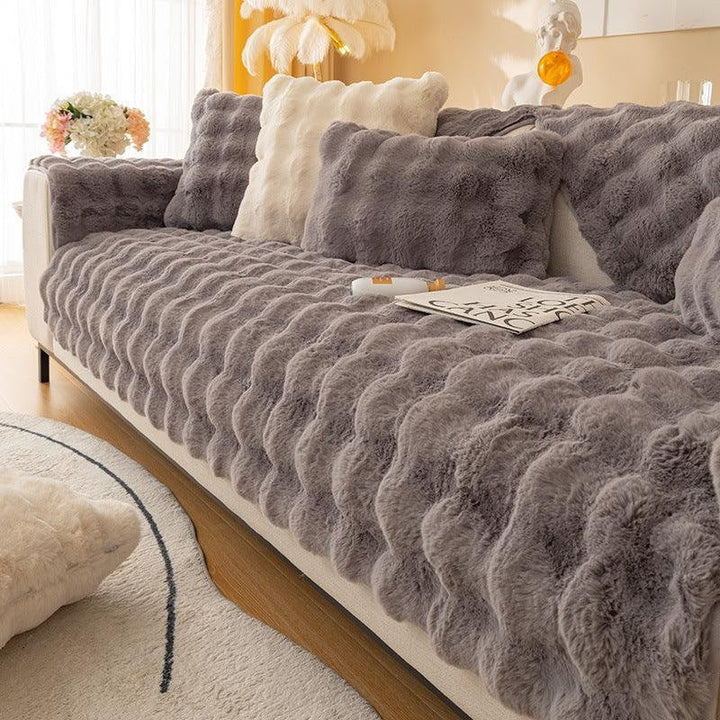 Cobertor de sofá drapeado de felpa, elegante y protector, ideal para dar un toque sofisticado a tu sala.