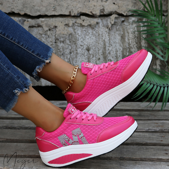 Zapatillas de entrenamiento para mujer con soporte extra y amortiguación avanzada. Perfectas para fitness y actividades deportivas.