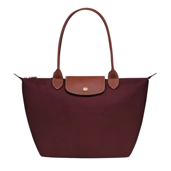Interior organizado del bolso de mano, mostrando su practicidad diaria para mujer y accesorios.