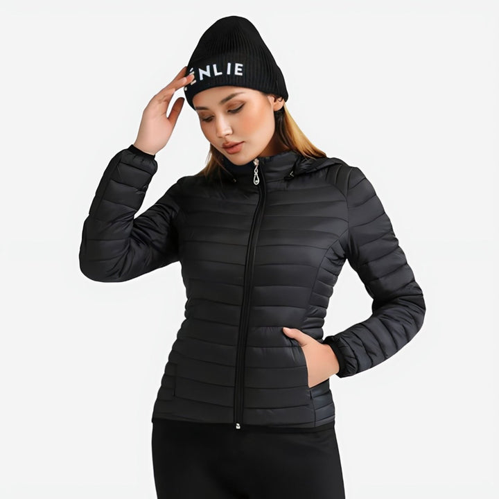 Abrigo ultraligero de mujer para invierno. Perfecto para deportes al exterior, senderismo y aventura.