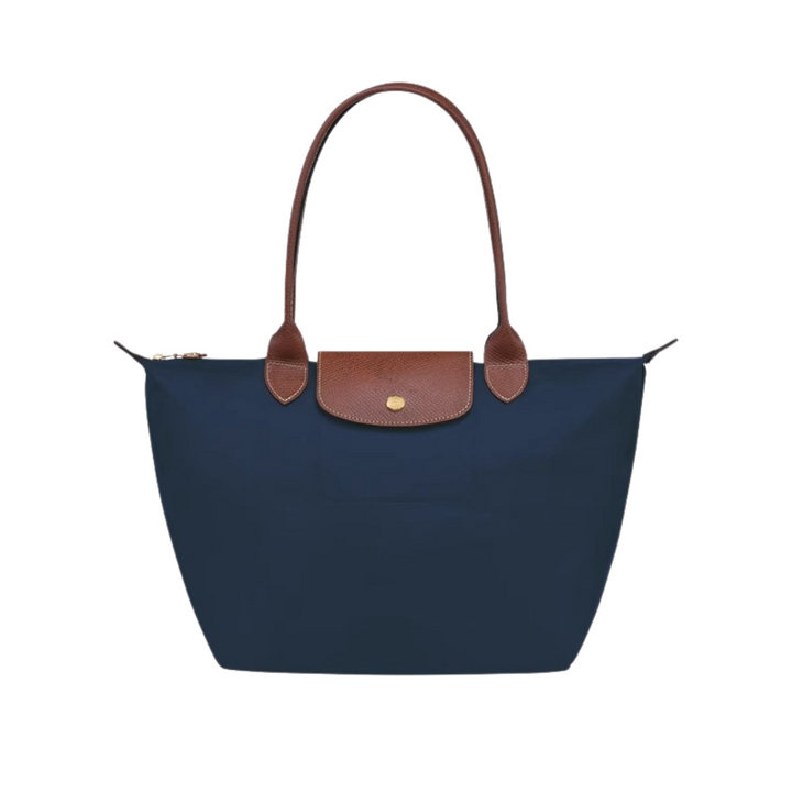 Bolso mujer espacioso y práctico, fabricado en nylon resistente y piel. Ideal para accesorios moda.