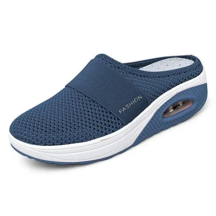 Soporte de arco avanzado en zapatillas ortopédicas OrthoAir. Reduce el dolor y mejora la postura al caminar.