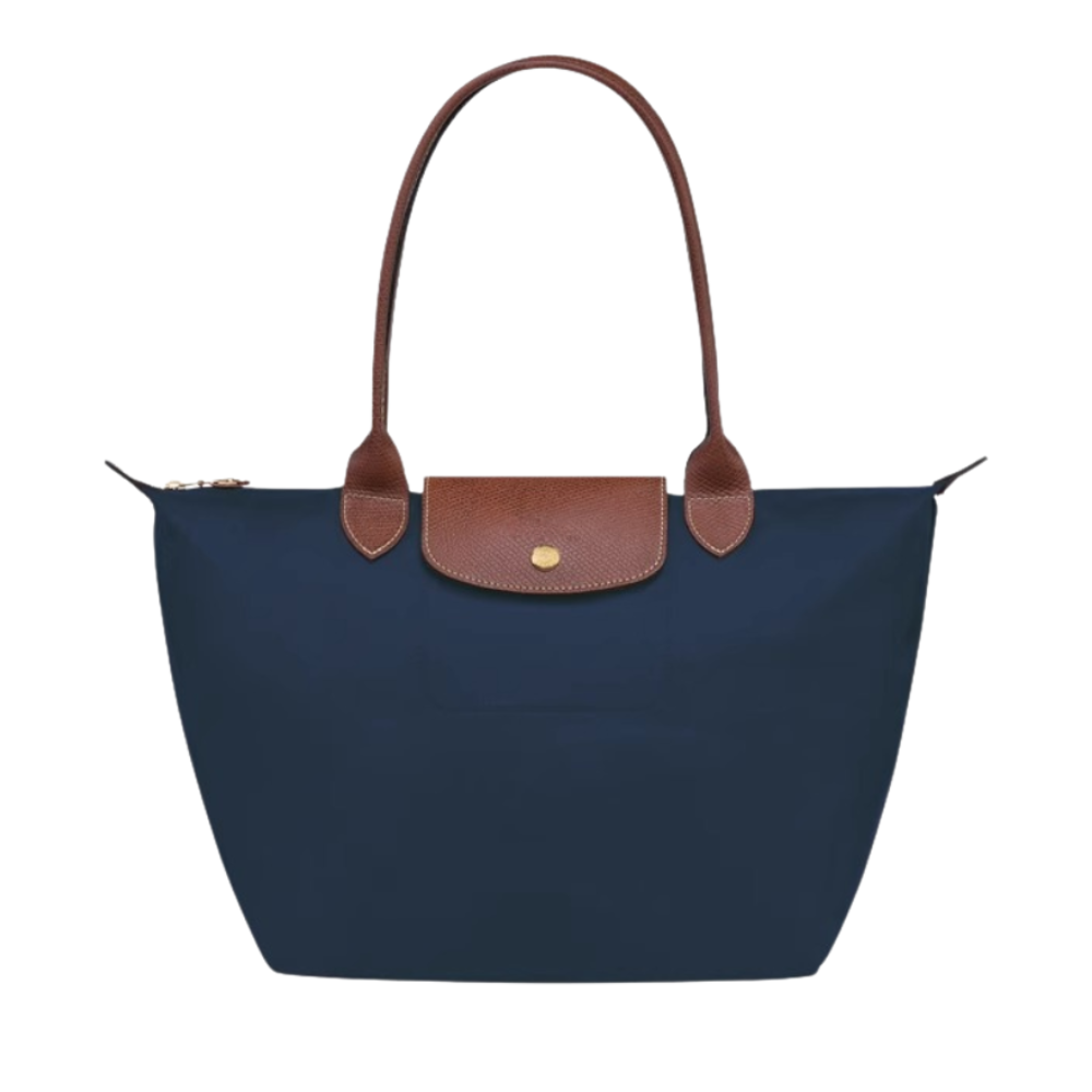 Accesorio de moda: bolso de mano nylon y piel, ideal para organizar tus esenciales con estilo.