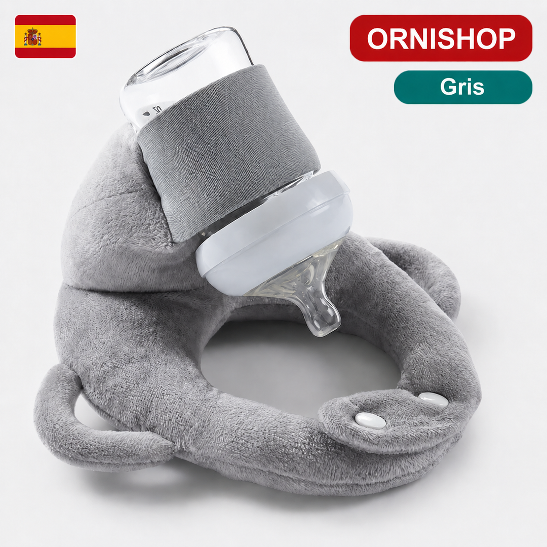 Primer plano de cojín portabiberón con biberón, mostrando su diseño ergonómico y soporte estable para el bebé.