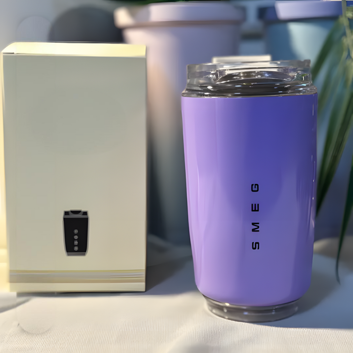 Elegante vaso térmico de acero inoxidable 500ml. Mantiene café caliente o bebidas frías. Regalo perfecto.
