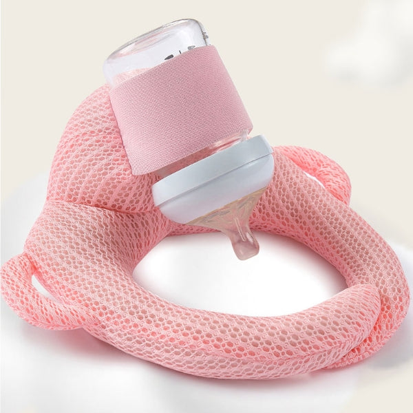 Cojín de alimentación para bebés con soporte de biberón. Diseño lavable y ergonómico para una lactancia cómoda.