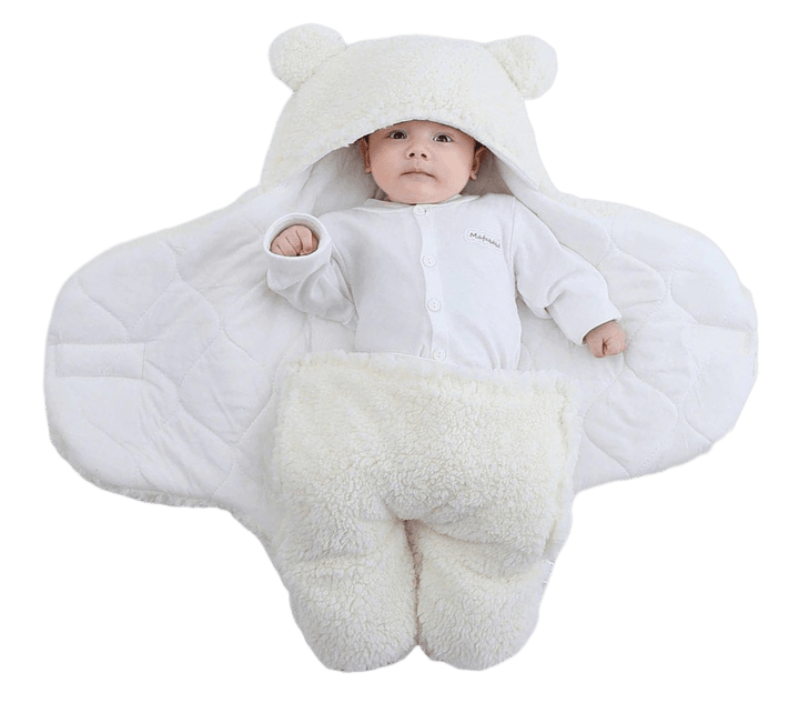 Manta envoltorio bebé, forro polar, orejas de osito. Calidez y confort para el paseo infantil.