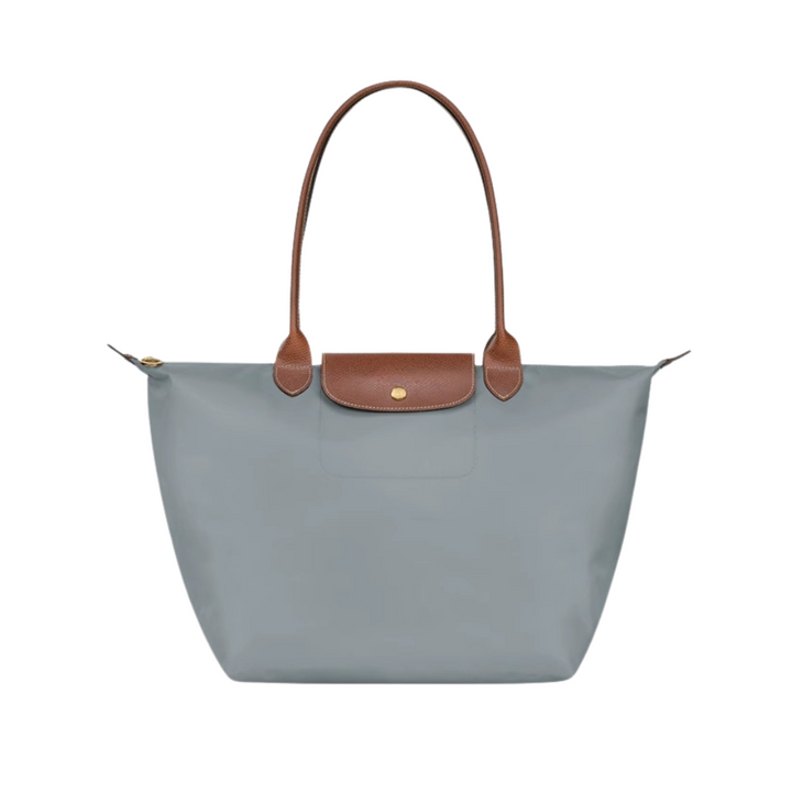 Bolso de mano para mujer con diseño elegante en nylon y acabados de piel. Un regalo ideal.