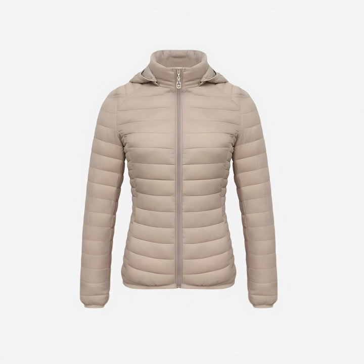 Abrigo ultraligero para mujer, acolchado y confortable. Perfecto para senderismo y aventura en invierno.