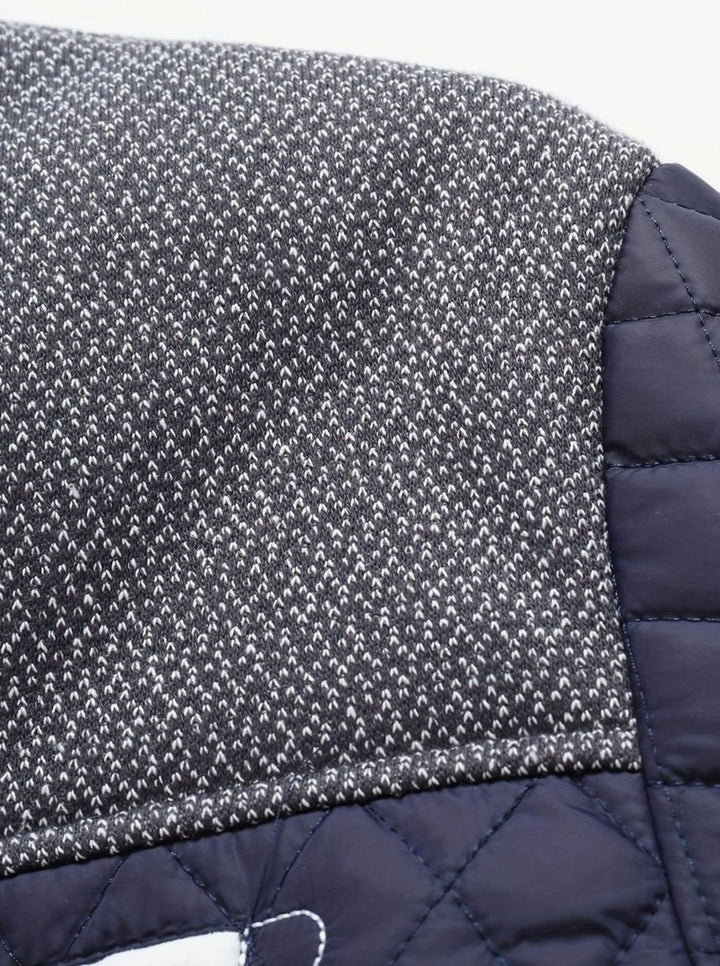 Chaqueta acolchada hombre cuello mao, abrigadora y ligera, para estilo casual de invierno.