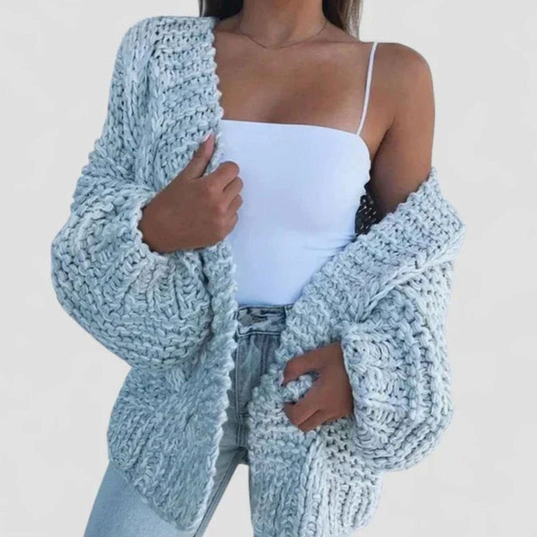 Suave cárdigan oversize de mujer, tejido grueso y estilo casual de otoño/invierno.