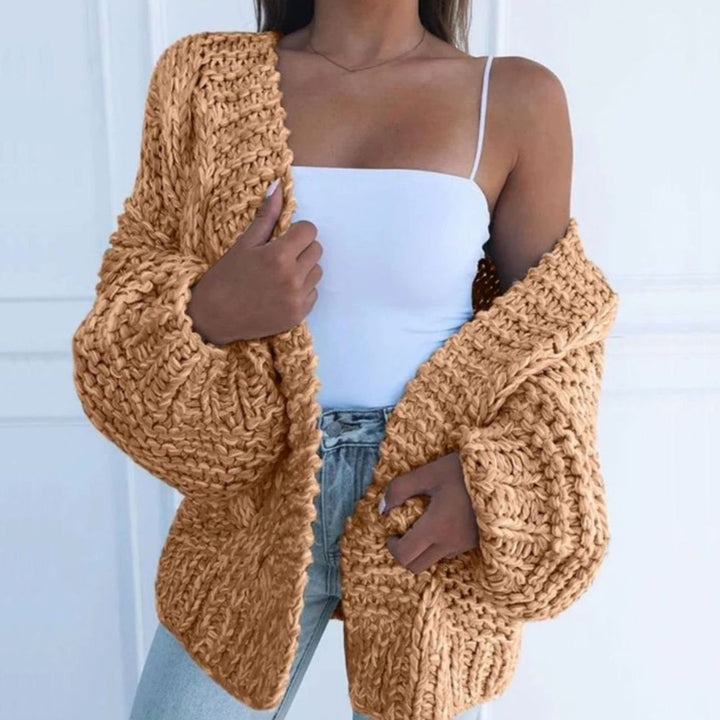 Cárdigan de punto grueso oversize, prenda esencial para capas en otoño e invierno para mujer.