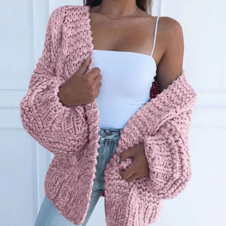 Elegante cárdigan oversize para mujer, de punto grueso y diseño abierto, moda de invierno.