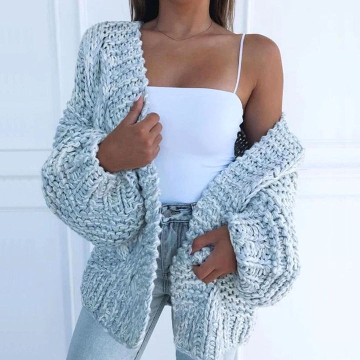 Cárdigan de mujer oversize, punto grueso, abierto. Abrigo casual versátil para otoño e invierno.