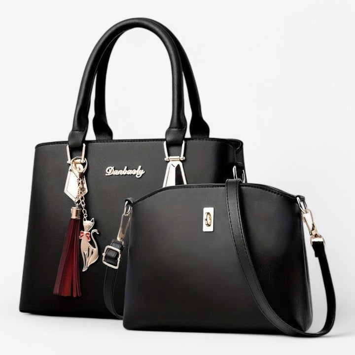 Bolso de mano sofisticado de polipiel para mujer, con asas robustas y acabado elegante. Accesorio de moda versátil.