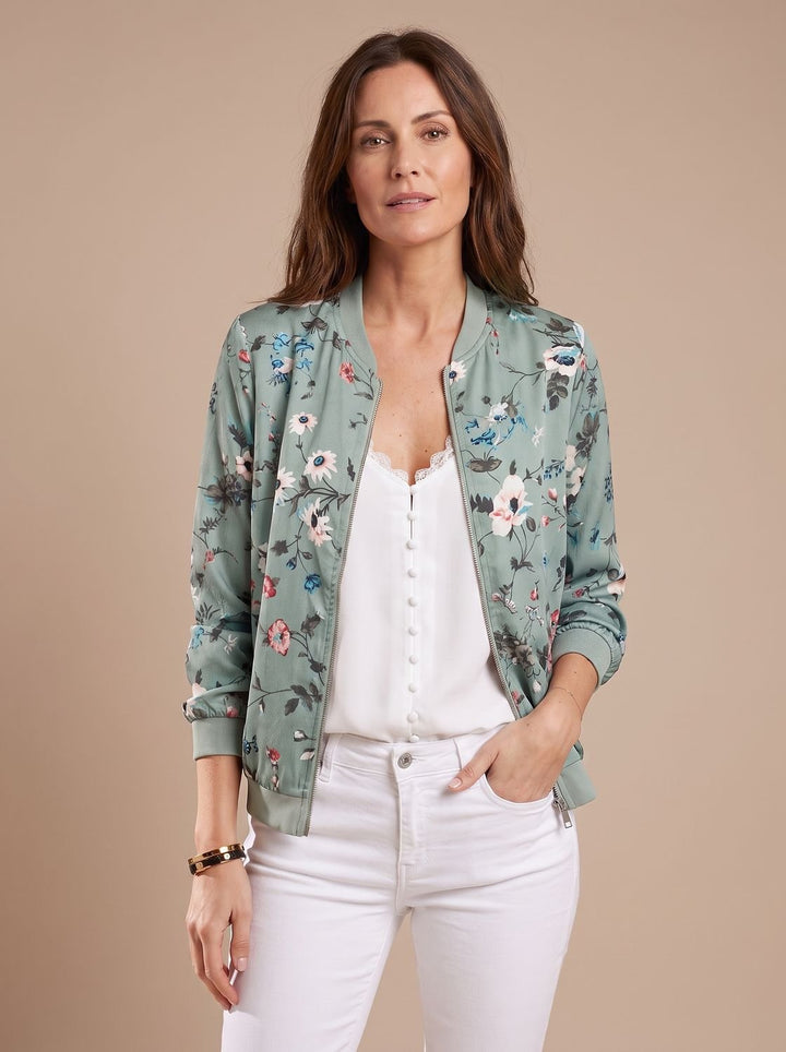 Cazadora bomber casual de mujer con estampado de flores de cerezo. Chaqueta ligera floral con cremallera para entretiempo.