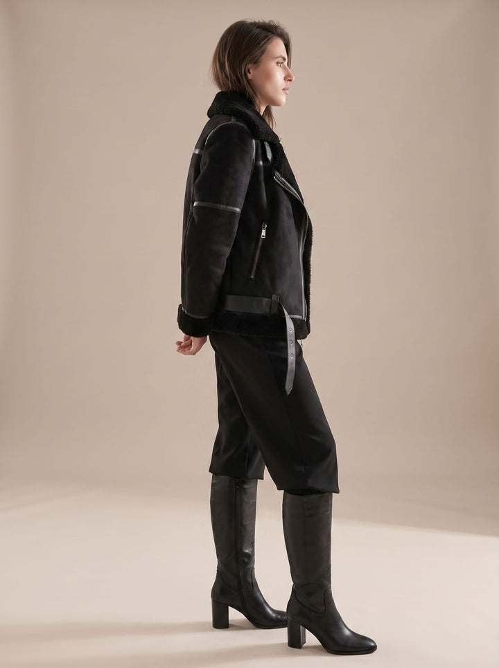 Chaqueta asimétrica de borreguito sintético para mujer. Estilo aviador y borreguito para invierno.