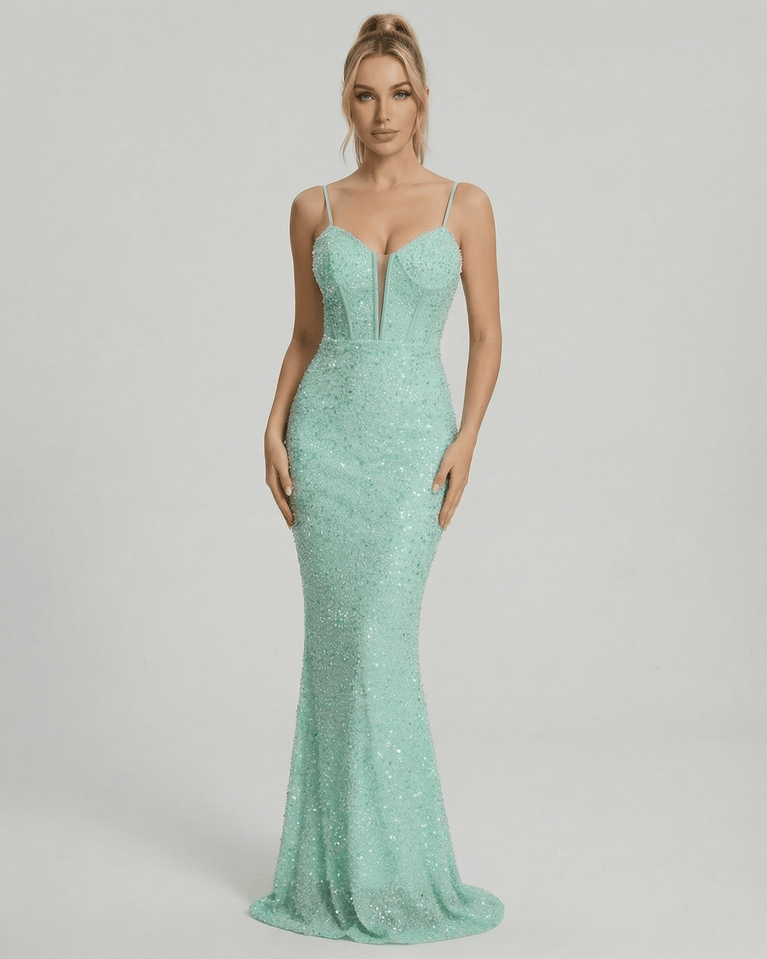 Vestido maxi celeste de lentejuelas para mujer, ideal para fiesta o noche. Elegante y brillante con escote profundo.