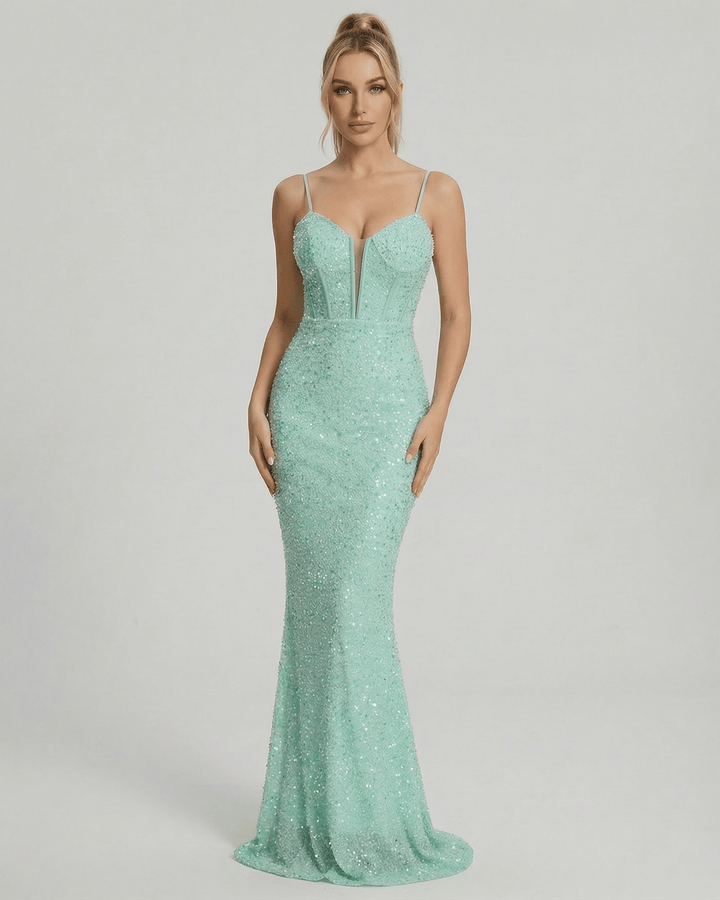 Vestido maxi celeste de lentejuelas para mujer, ideal para fiesta o noche. Elegante y brillante con escote profundo.