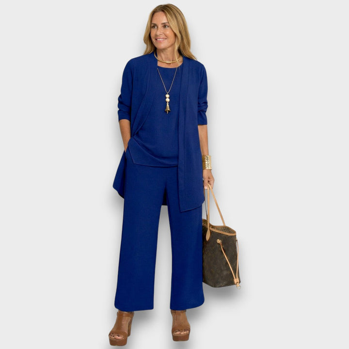 Conjunto azul minimalista de 3 piezas para mujer, incluye pantalón ancho, chaleco y blusa. Estilo moderno.
