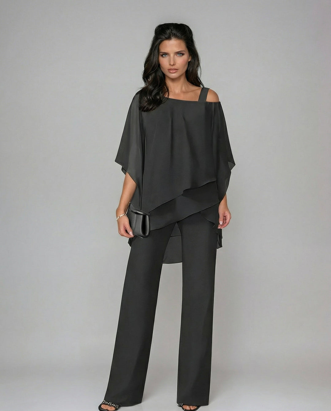 Conjunto de moda para mujer, dos piezas fluidas con pantalón ancho, estilo moderno y confortable para fiesta.