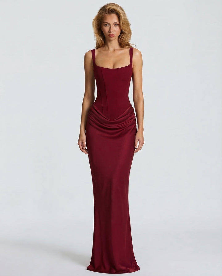 Vestido de moda femenina, maxi elegante con corsé, define cintura reloj de arena.