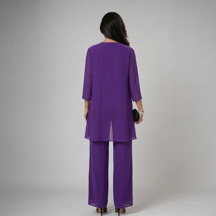 Conjunto de fiesta para mujer, elegante y versátil, con pantalón fluido, top y chaqueta a juego.