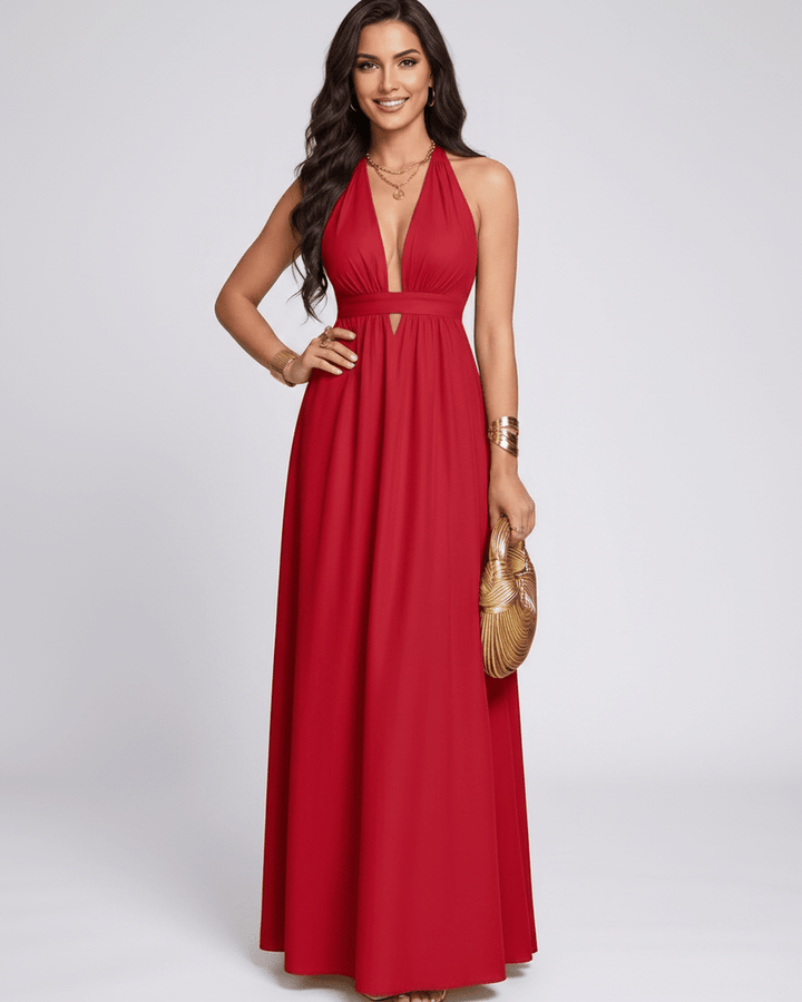 Vestido largo sin mangas, escote halter, diseño fluido. Vestido de mujer elegante, ideal para verano.