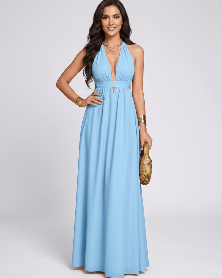 Vestido maxi fluido, sin mangas, con escote halter. Moda femenina, estilo elegante.