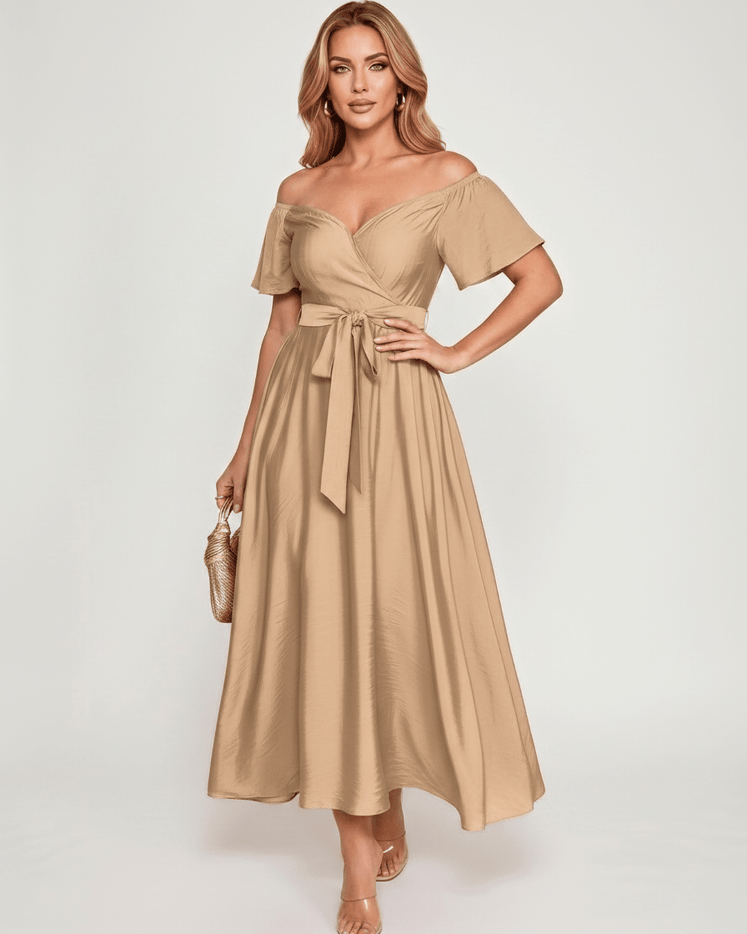 Moda femenina: vestido largo de noche con hombros descubiertos, estilo elegante y sofisticado.