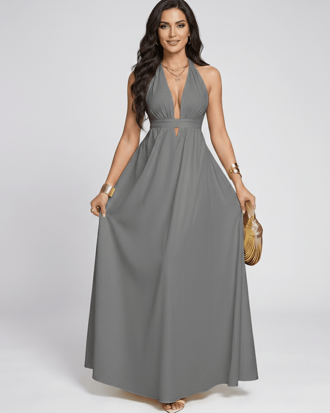 Vestido maxi elegante de mujer con escote halter. Diseño fluido y sin mangas.