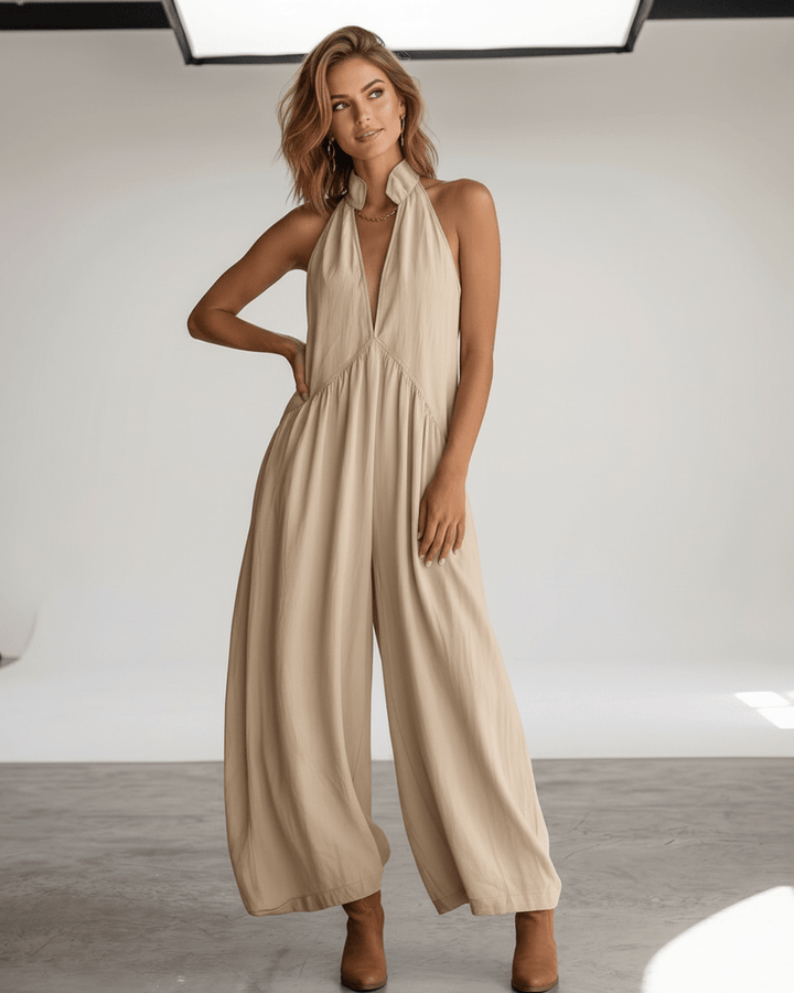 Vestido maxi con bolsillos discretos, cuello halter y diseño sin mangas para mujer.