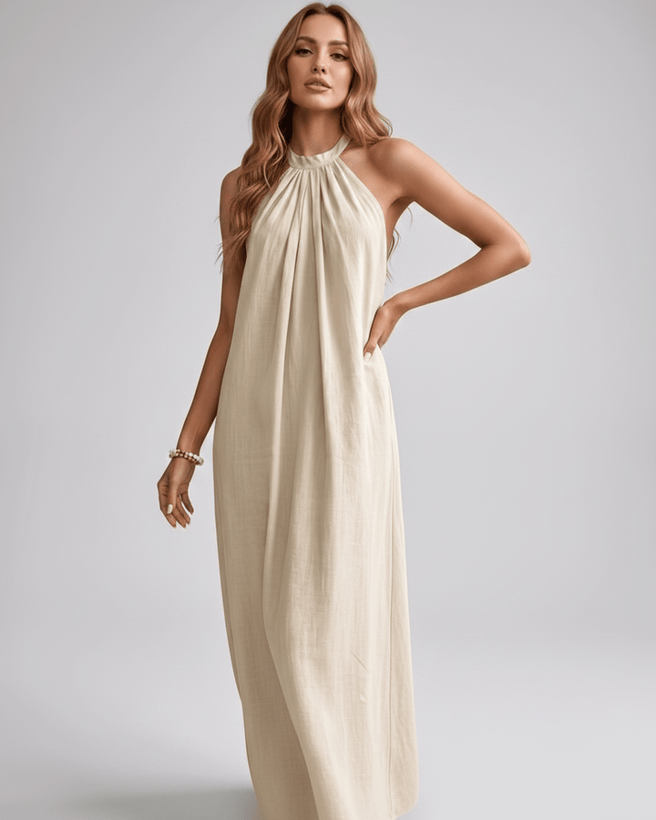 Ropa femenina: vestido sin mangas halter, ajuste holgado para el confort estival.